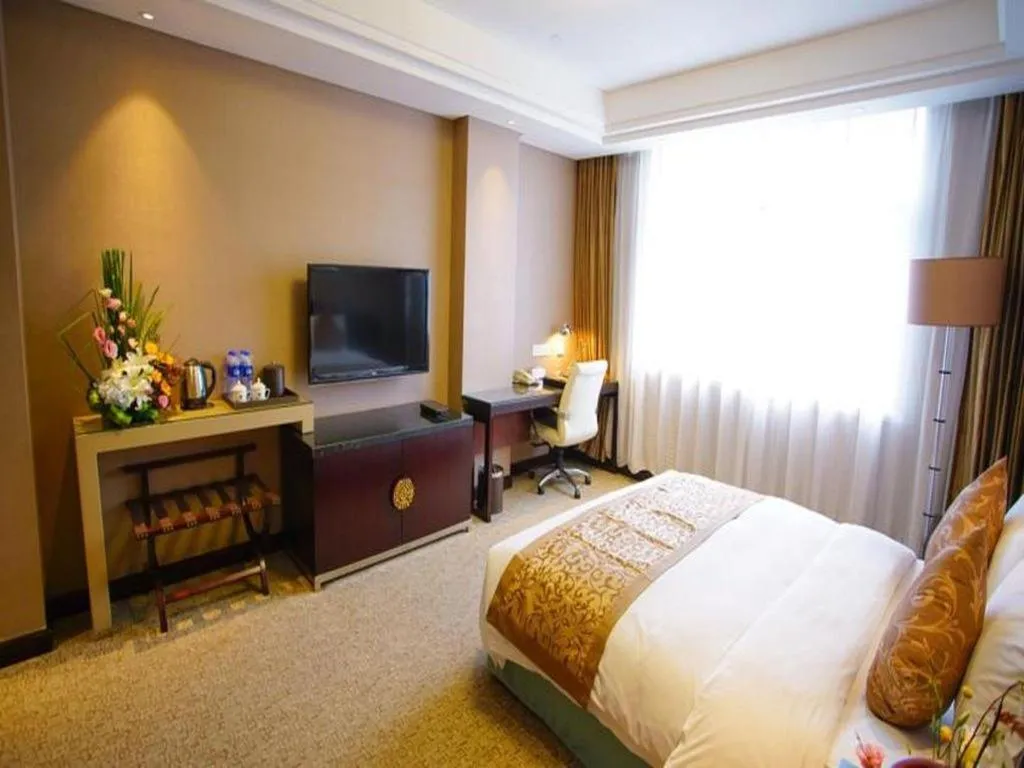 Bed in Xian Grand Soluxe International Hotel