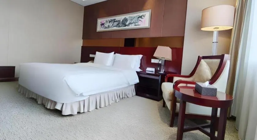 Bed in Xian Grand Soluxe International Hotel