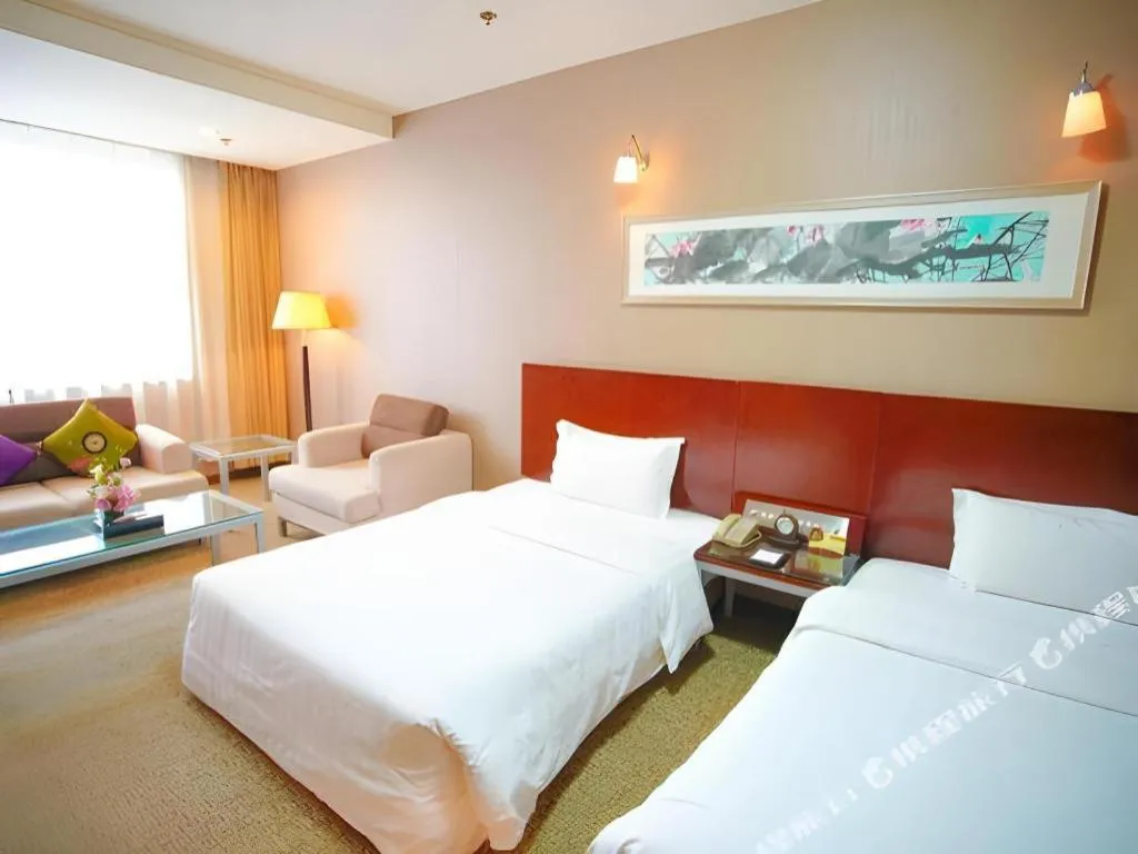 Bed in Xian Grand Soluxe International Hotel