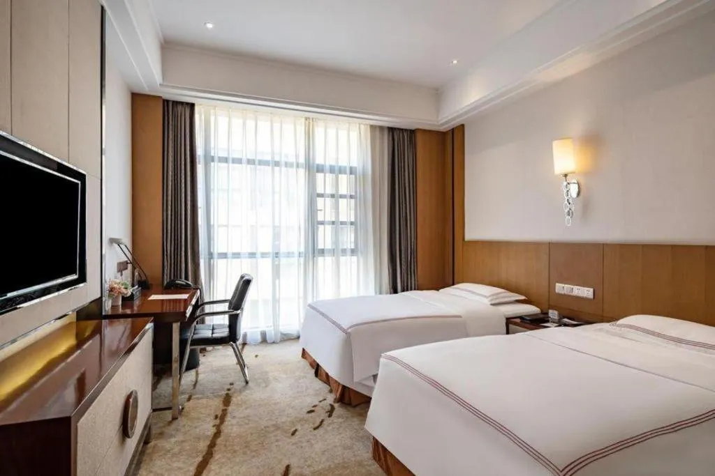 Bed in Shanghai Manhattan Hotel Minhang