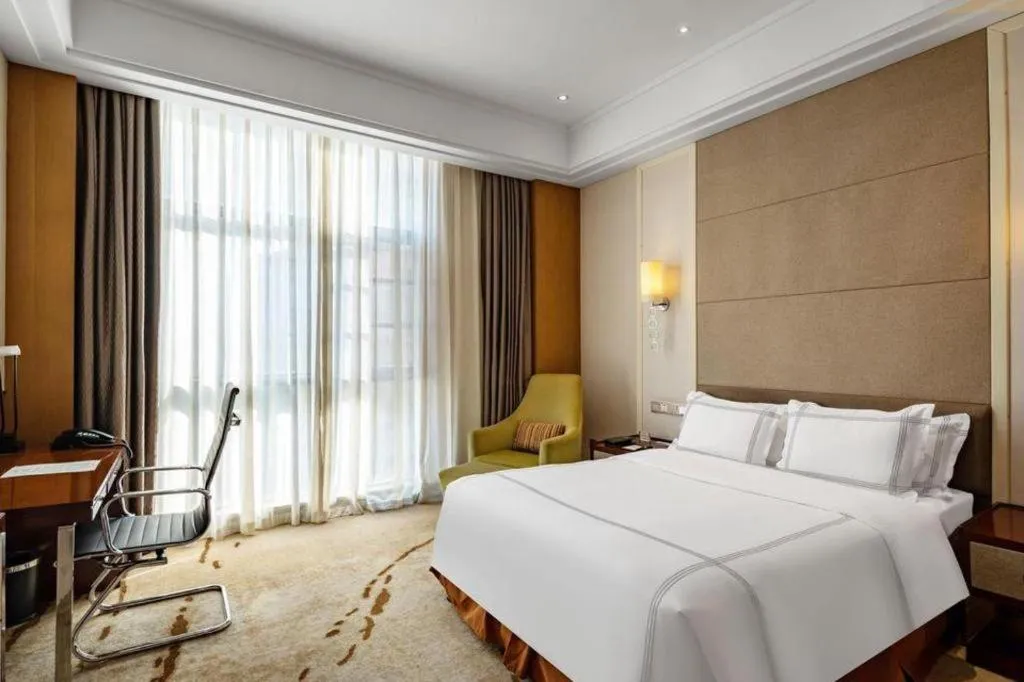 Bed in Shanghai Manhattan Hotel Minhang