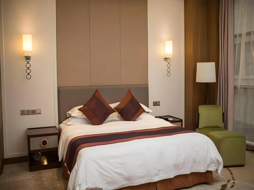 Bed in Shanghai Manhattan Hotel Minhang
