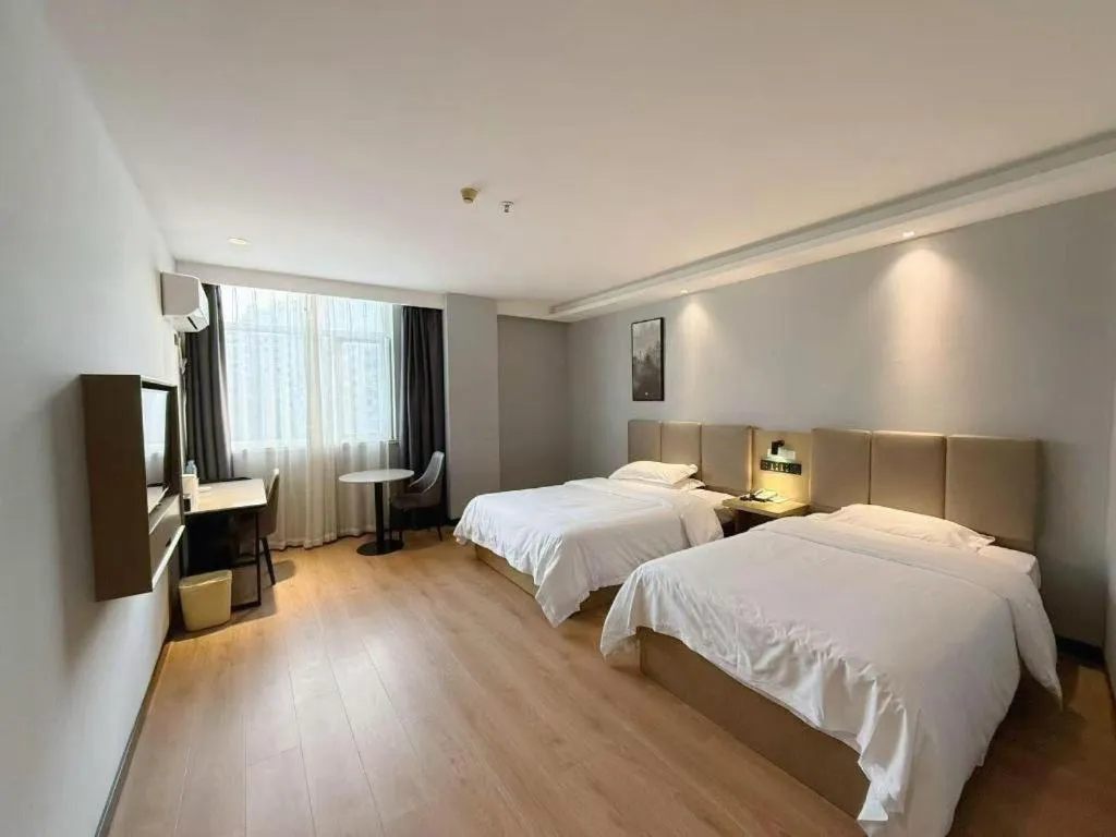 Bed in GreenTree Inn Hefei East Wangjiang Road CTCE Express Hotel