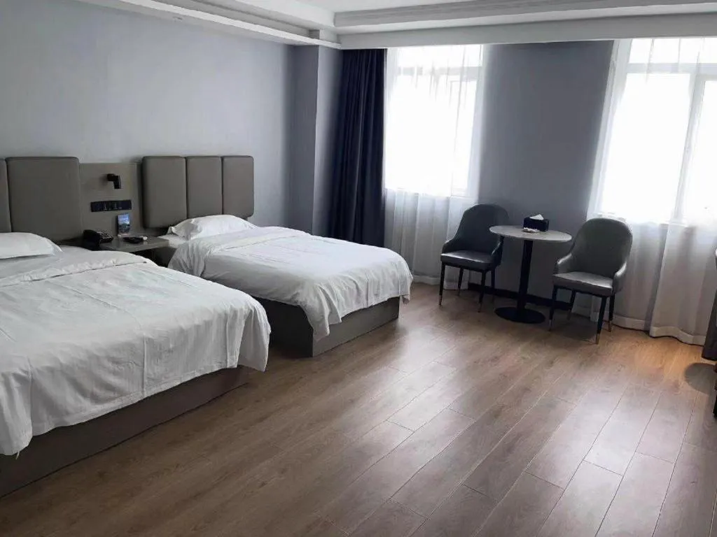 Bed in GreenTree Inn Hefei East Wangjiang Road CTCE Express Hotel