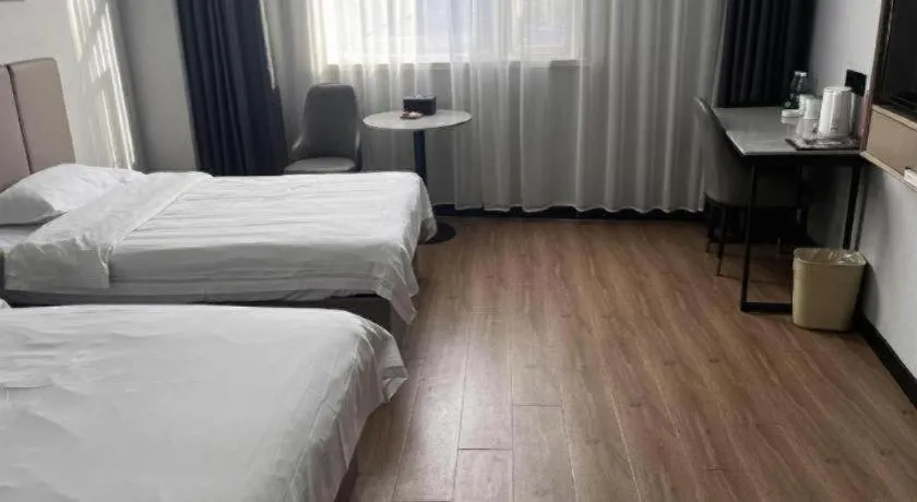 Bed in GreenTree Inn Hefei East Wangjiang Road CTCE Express Hotel
