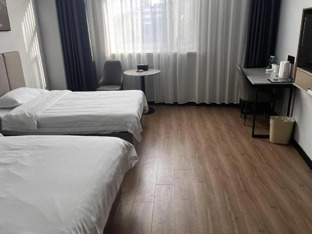 Bed in GreenTree Inn Hefei East Wangjiang Road CTCE Express Hotel