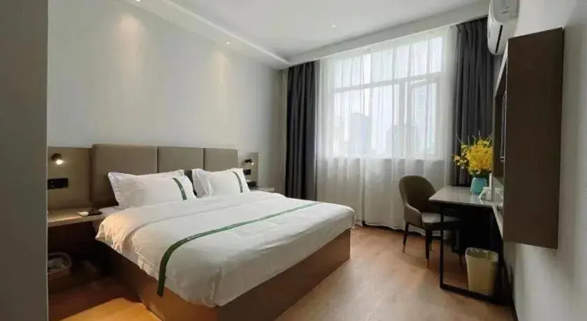 Bed in GreenTree Inn Hefei East Wangjiang Road CTCE Express Hotel Bed in GreenTree Inn Hefei East Wangjiang Road CTCE Express Hotel