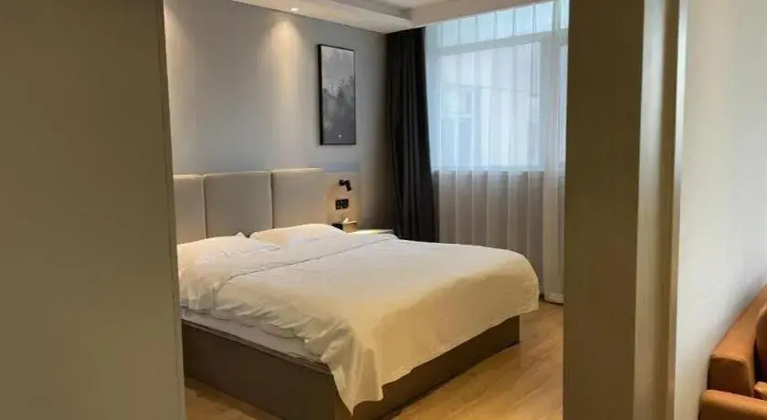 Bed in GreenTree Inn Hefei East Wangjiang Road CTCE Express Hotel Bed in GreenTree Inn Hefei East Wangjiang Road CTCE Express Hotel
