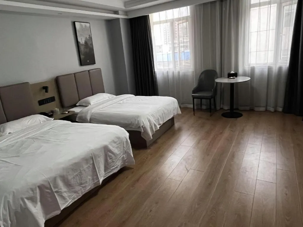 Bed in GreenTree Inn Hefei East Wangjiang Road CTCE Express Hotel