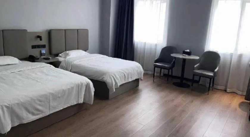 Bed in GreenTree Inn Hefei East Wangjiang Road CTCE Express Hotel