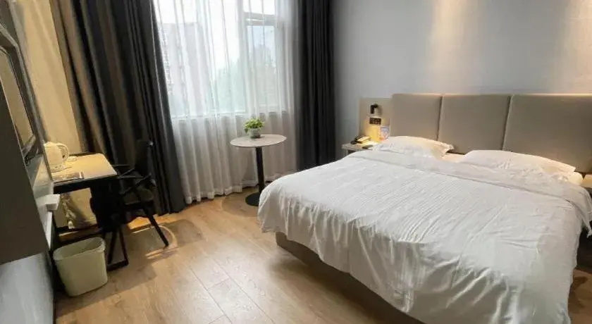 Bed in GreenTree Inn Hefei East Wangjiang Road CTCE Express Hotel Bed in GreenTree Inn Hefei East Wangjiang Road CTCE Express Hotel