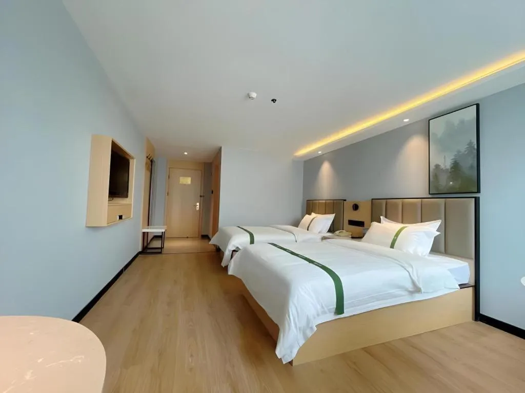 Bed in GreenTree Inn Hefei East Wangjiang Road CTCE Express Hotel