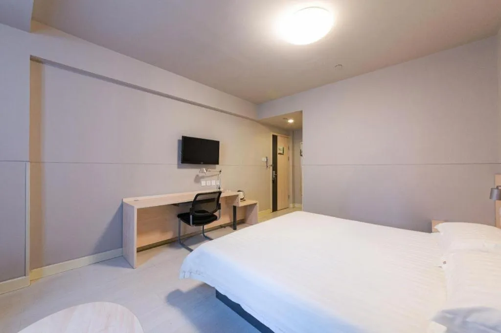 Bed in Jinjiang Inn Wuhan Linjiaohu Wanda Branch
