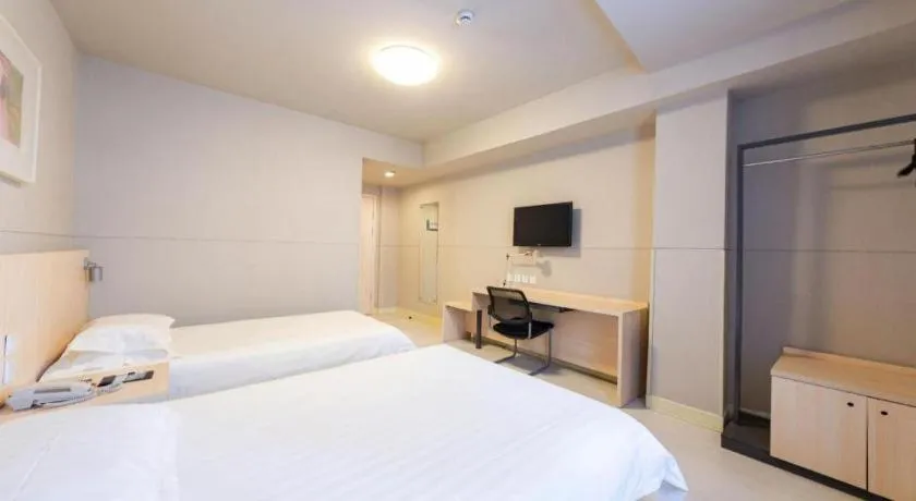 Bed in Jinjiang Inn Wuhan Linjiaohu Wanda Branch