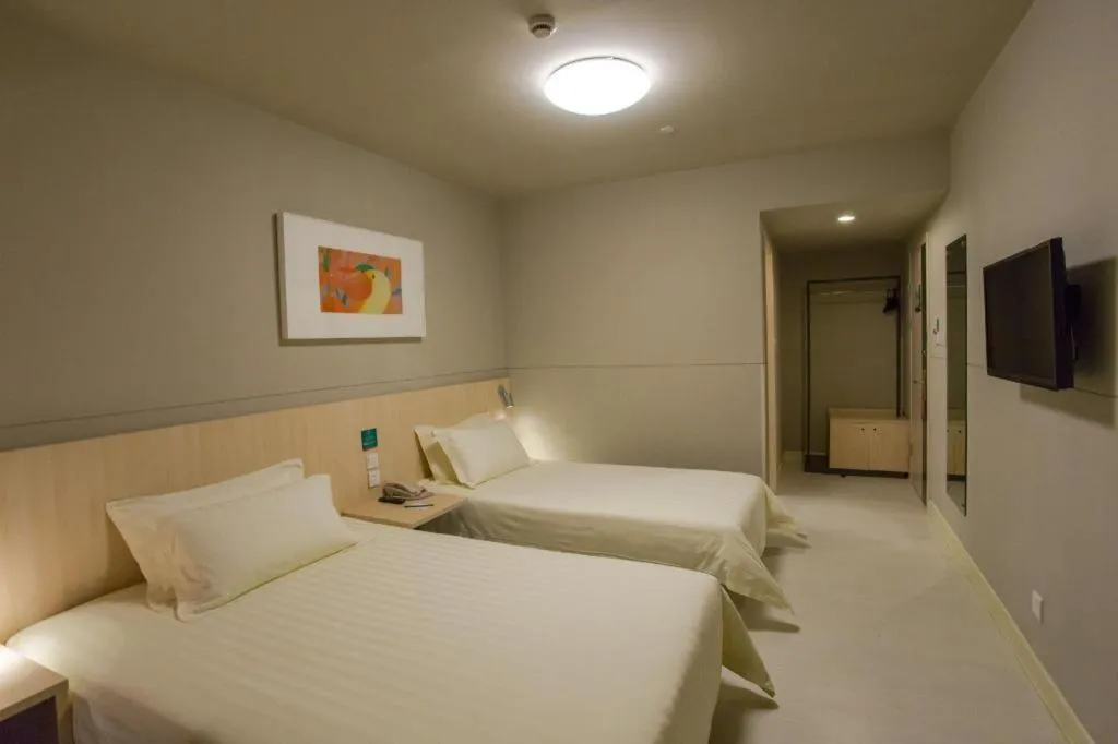 Bed in Jinjiang Inn Wuhan Linjiaohu Wanda Branch