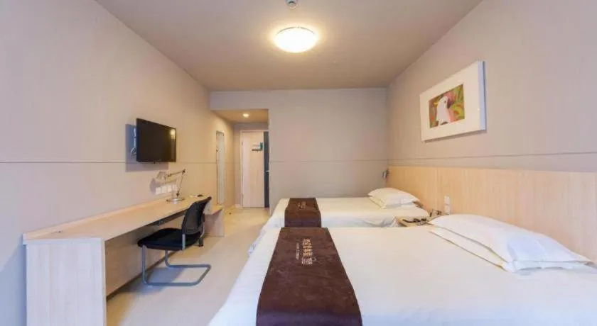 Bed in Jinjiang Inn Wuhan Linjiaohu Wanda Branch