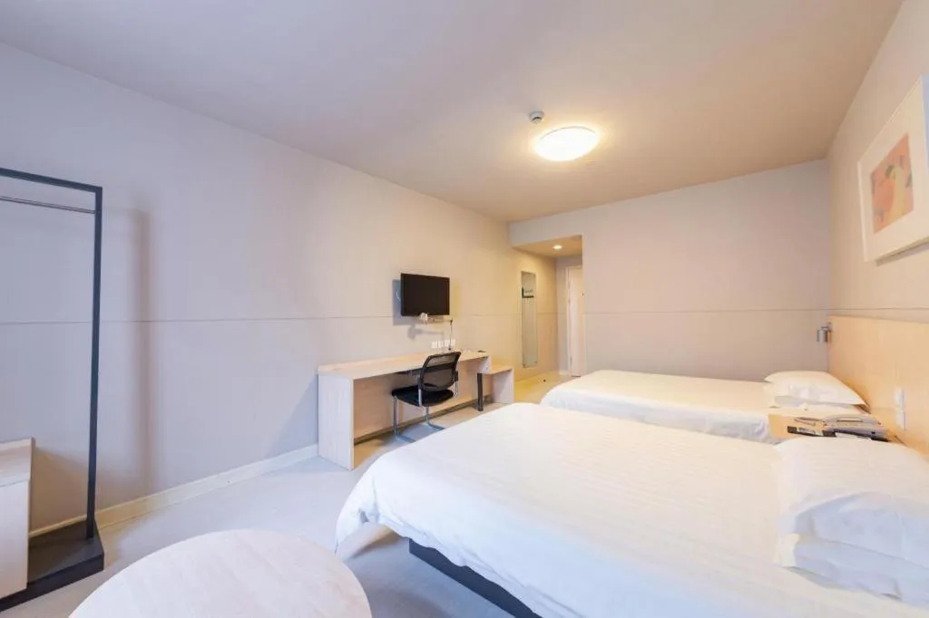 Bed in Jinjiang Inn Wuhan Linjiaohu Wanda Branch