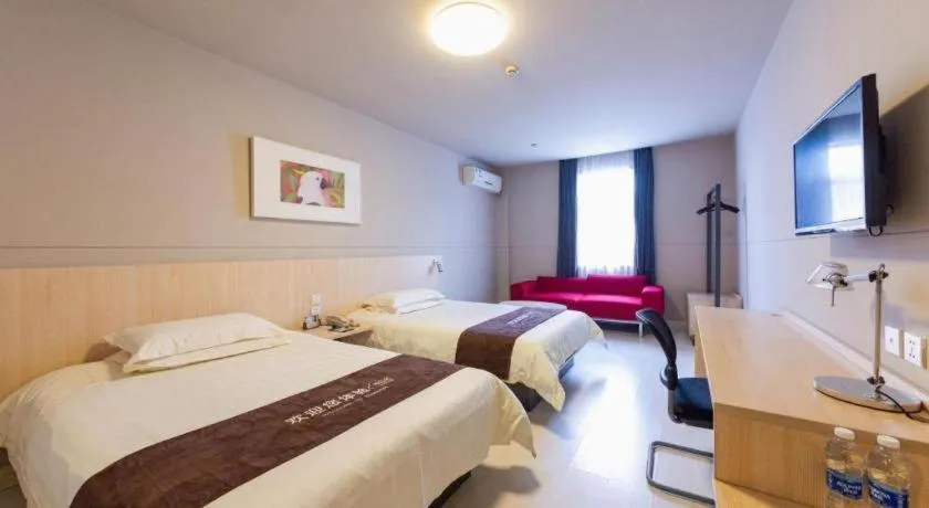Bed in Jinjiang Inn Wuhan Linjiaohu Wanda Branch