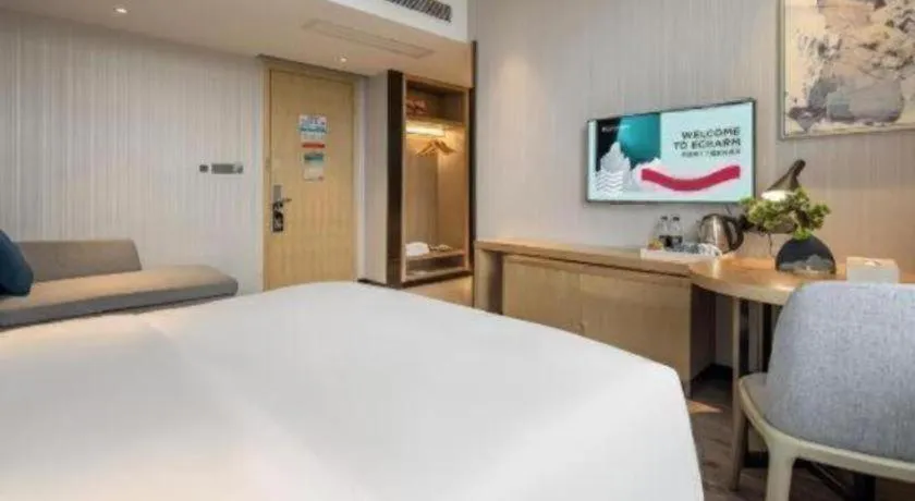 Bed in Echarm Hotel Baise Sports Center Dream Island Plaza