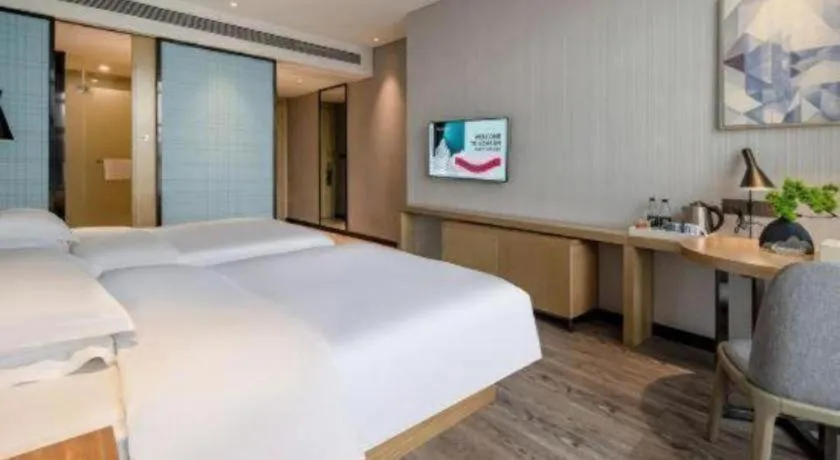 Bed in Echarm Hotel Baise Sports Center Dream Island Plaza