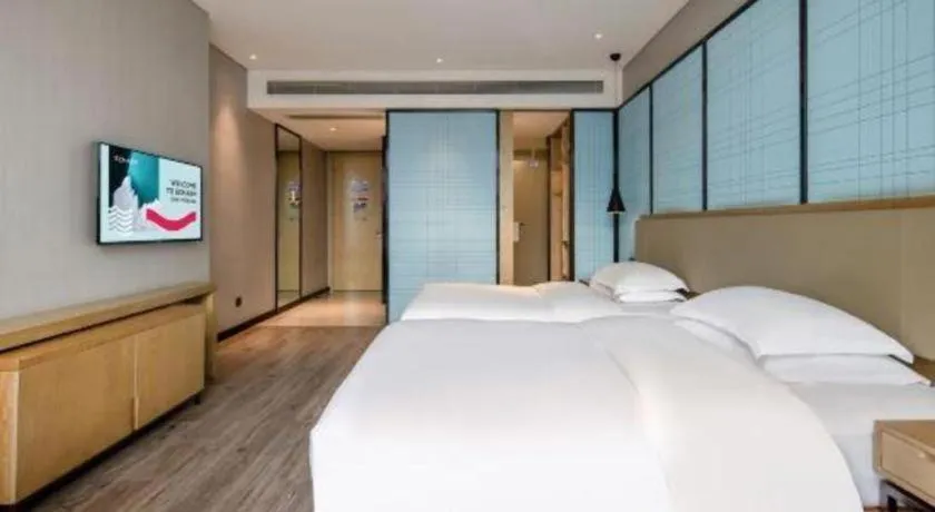 Bed in Echarm Hotel Baise Sports Center Dream Island Plaza