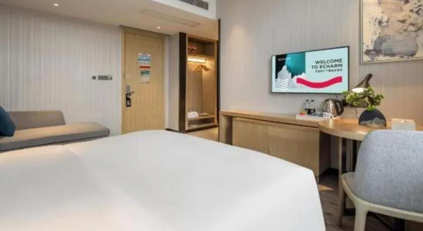 Bed in Echarm Hotel Baise Sports Center Dream Island Plaza