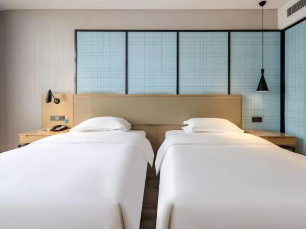 Bed in Echarm Hotel Baise Sports Center Dream Island Plaza