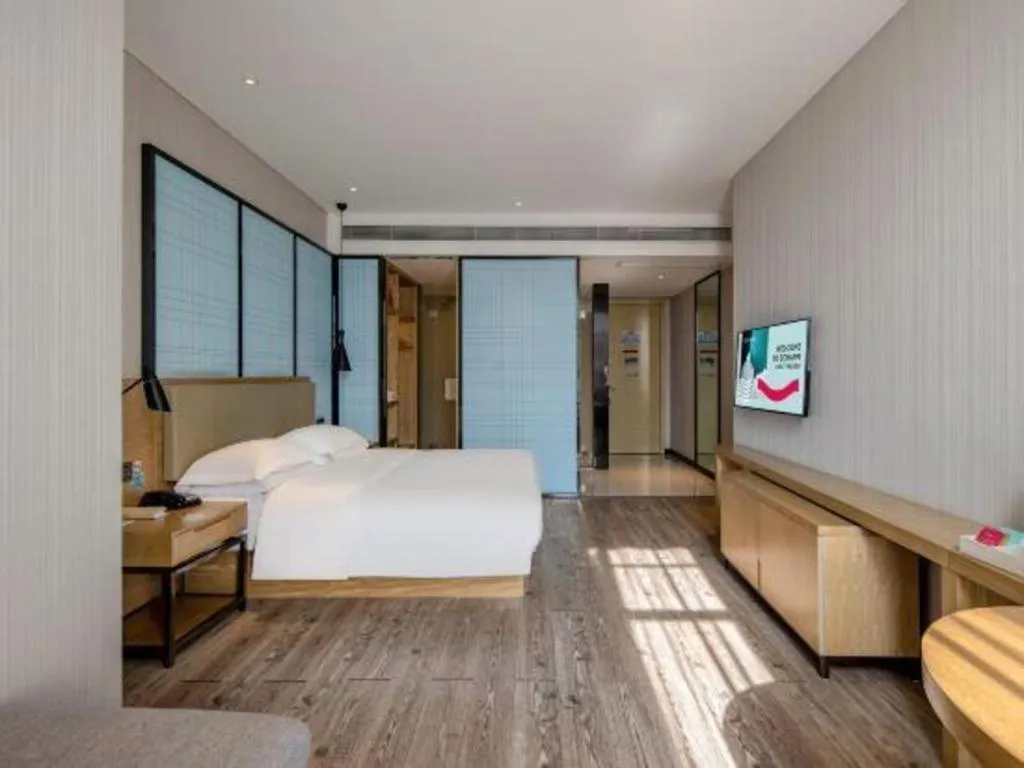 Bed in Echarm Hotel Baise Sports Center Dream Island Plaza