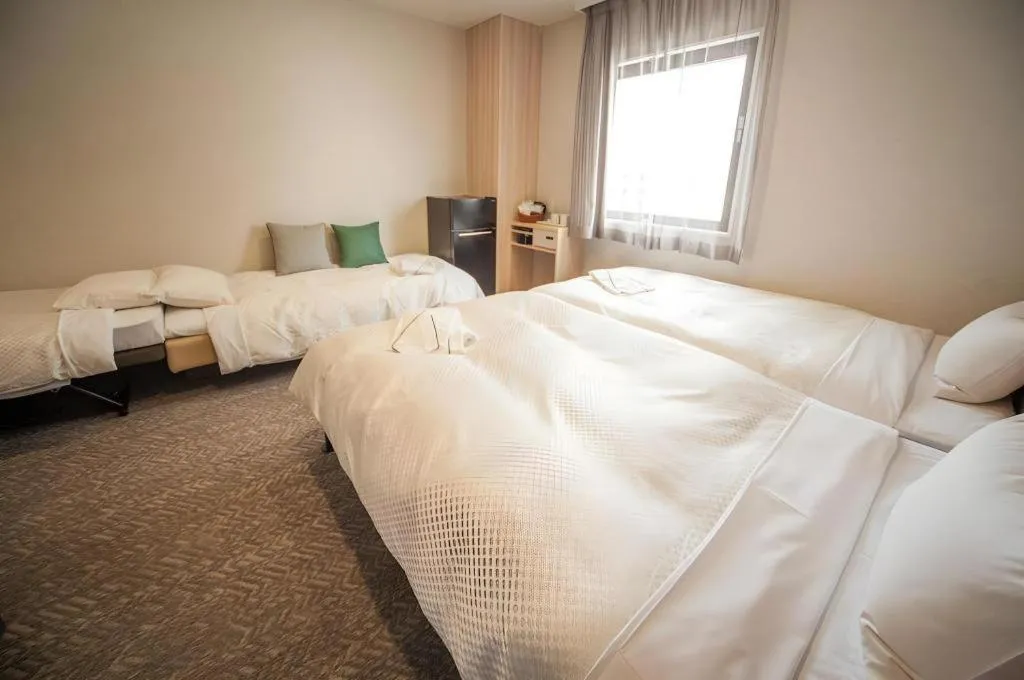 Bed in Hotel IL FIORE Kasai ANNEX