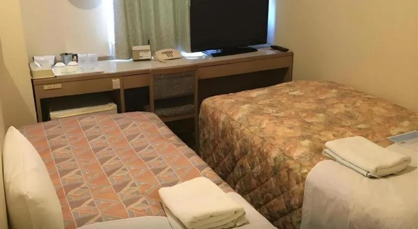 Bed in Hotel IL FIORE Kasai ANNEX