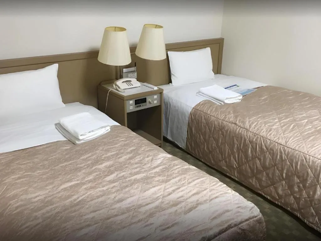 Bed in Hotel IL FIORE Kasai ANNEX