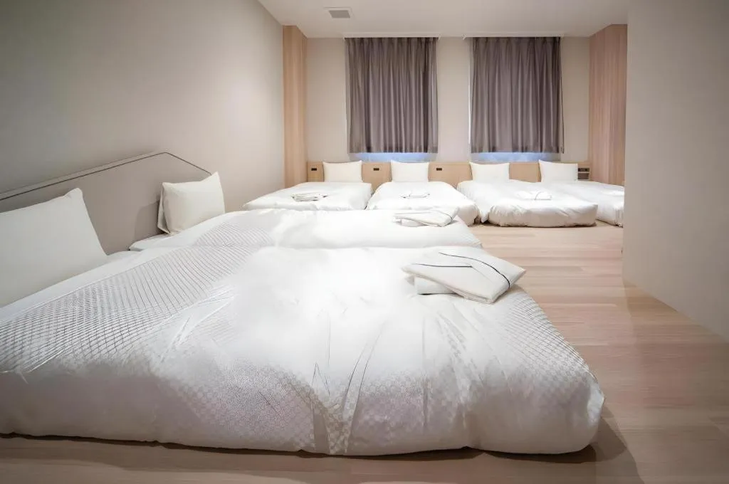Bed in Hotel IL FIORE Kasai ANNEX