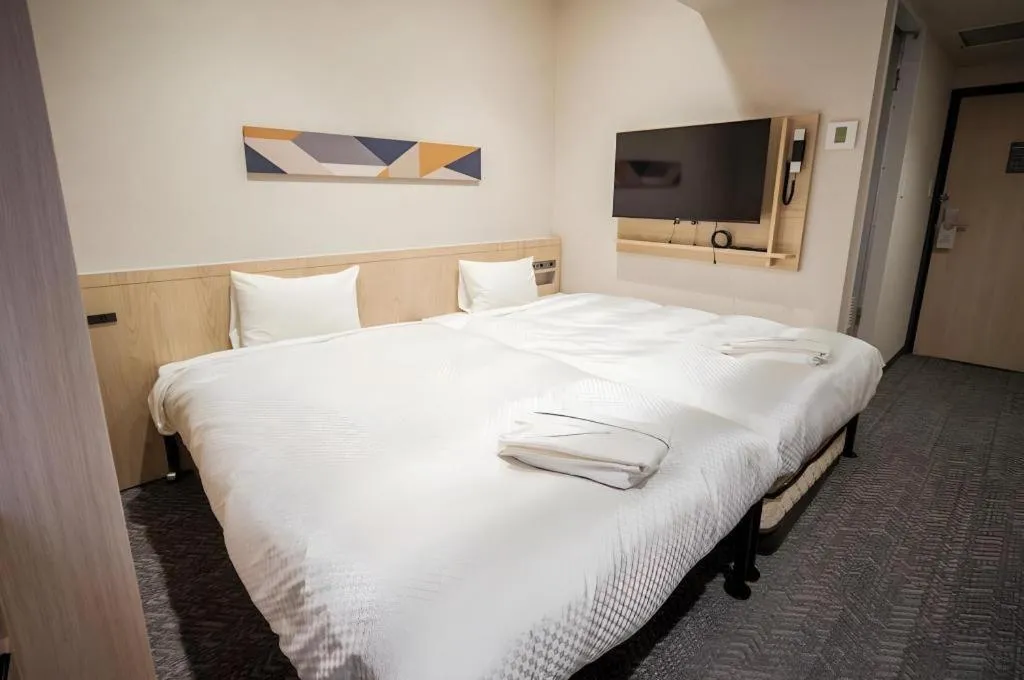 Bed in Hotel IL FIORE Kasai ANNEX