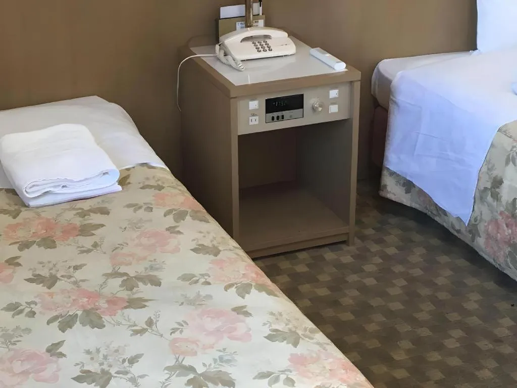 Bed in Hotel IL FIORE Kasai ANNEX