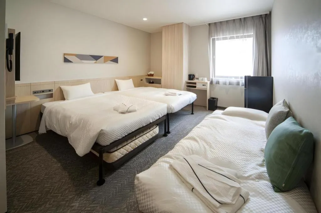 Bed in Hotel IL FIORE Kasai ANNEX