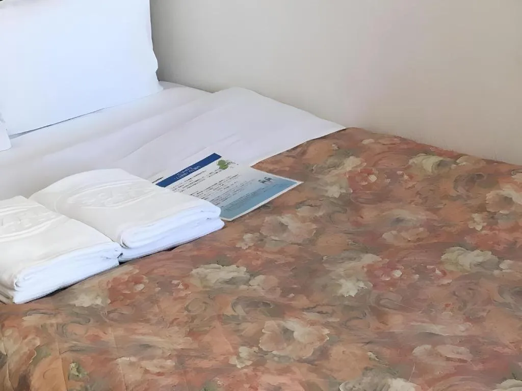 Bed in Hotel IL FIORE Kasai ANNEX