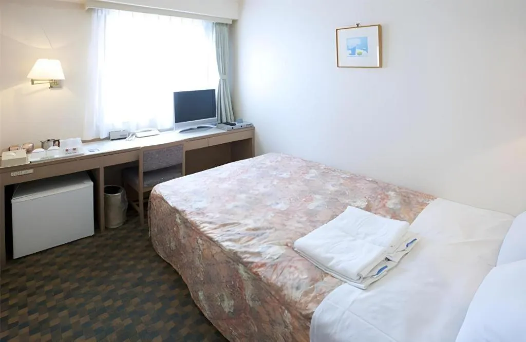 Bed in Hotel IL FIORE Kasai ANNEX