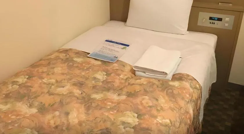 Bed in Hotel IL FIORE Kasai ANNEX