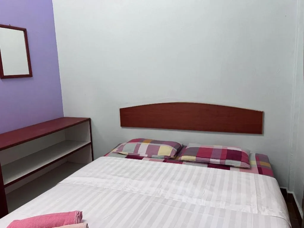 Bed in OYO 90967 Homestay Chalet Warisan Siti