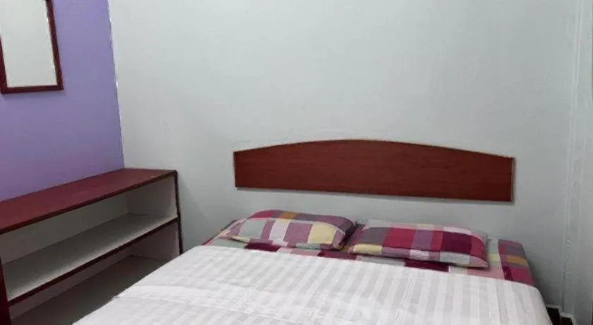 Bed in OYO 90967 Homestay Chalet Warisan Siti