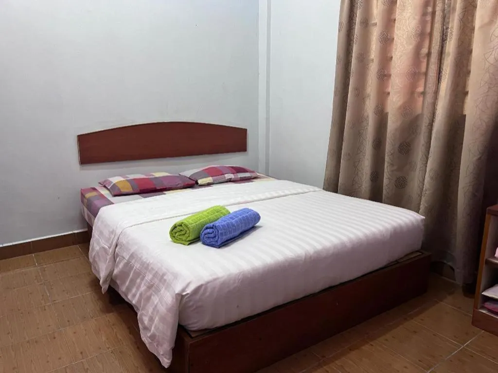 Bed in OYO 90967 Homestay Chalet Warisan Siti