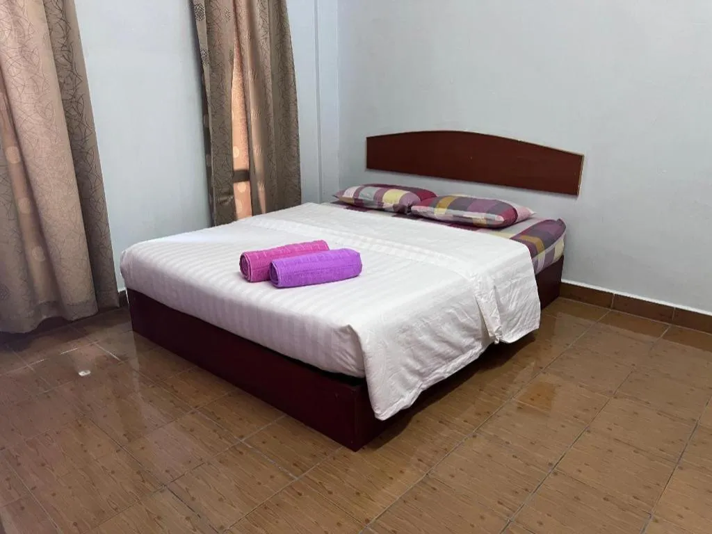 Bed in OYO 90967 Homestay Chalet Warisan Siti