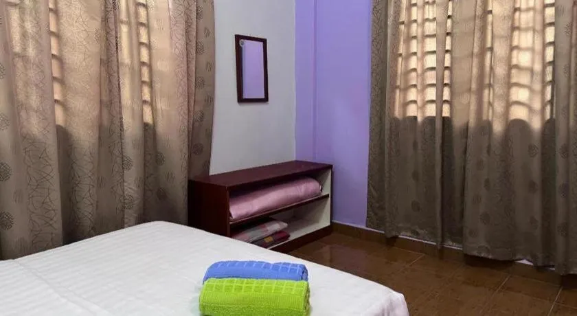 Bed in OYO 90967 Homestay Chalet Warisan Siti