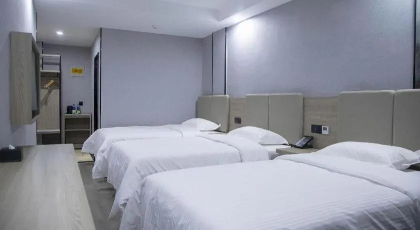 Bed in GreenTree Inn Anqing Tongcheng South Shengtang Road Shengtang International Business Hotel