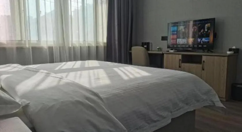 Bed in GreenTree Inn Anqing Tongcheng South Shengtang Road Shengtang International Business Hotel