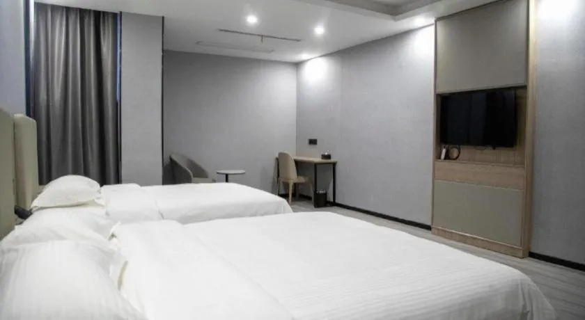 Bed in GreenTree Inn Anqing Tongcheng South Shengtang Road Shengtang International Business Hotel