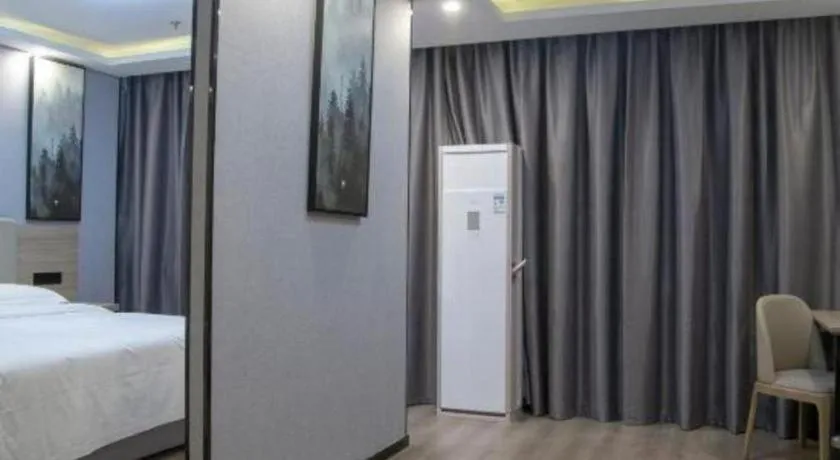 Bed in GreenTree Inn Anqing Tongcheng South Shengtang Road Shengtang International Business Hotel