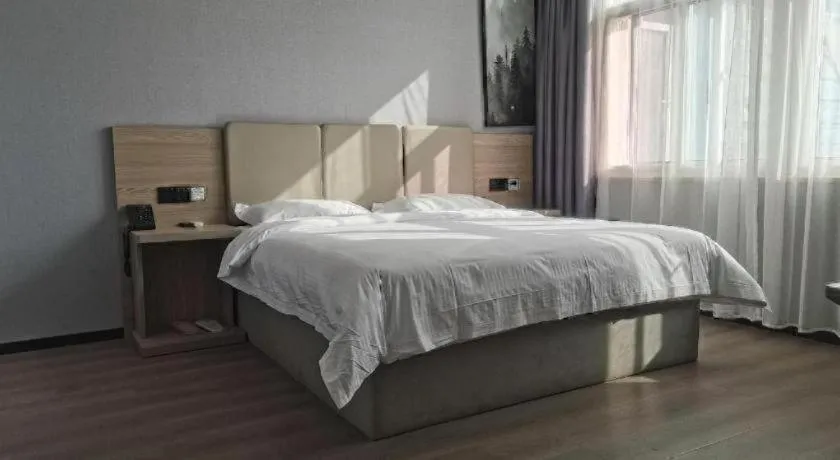 Bed in GreenTree Inn Anqing Tongcheng South Shengtang Road Shengtang International Business Hotel