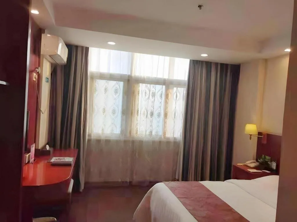 Bed in GreenTree Inn Anqing Tongcheng South Shengtang Road Shengtang International Business Hotel