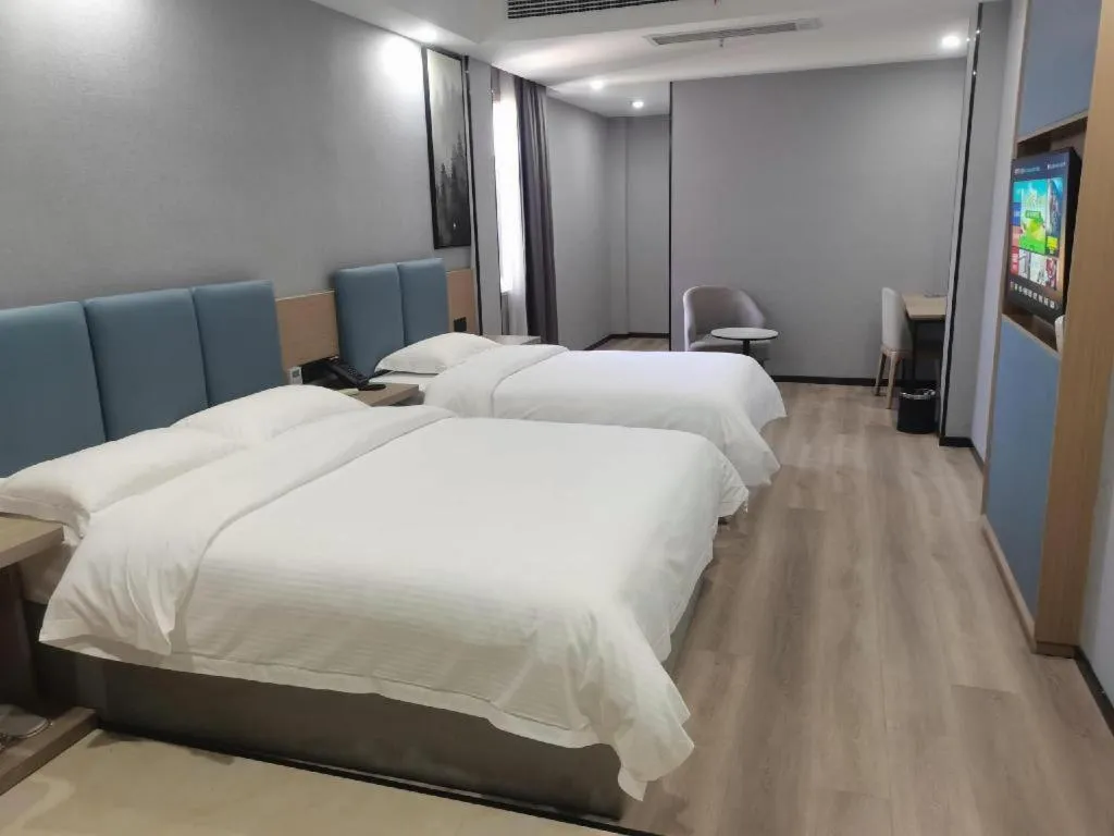 Bed in GreenTree Inn Anqing Tongcheng South Shengtang Road Shengtang International Business Hotel